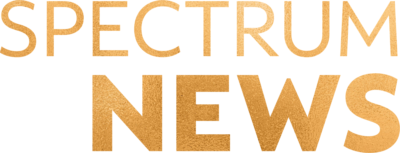 Logotipo de Spectrum News: dorado.